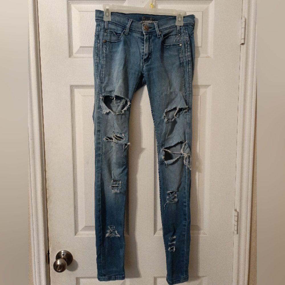 Vintage Women's Blue Distressed Pepe Style London Jeans